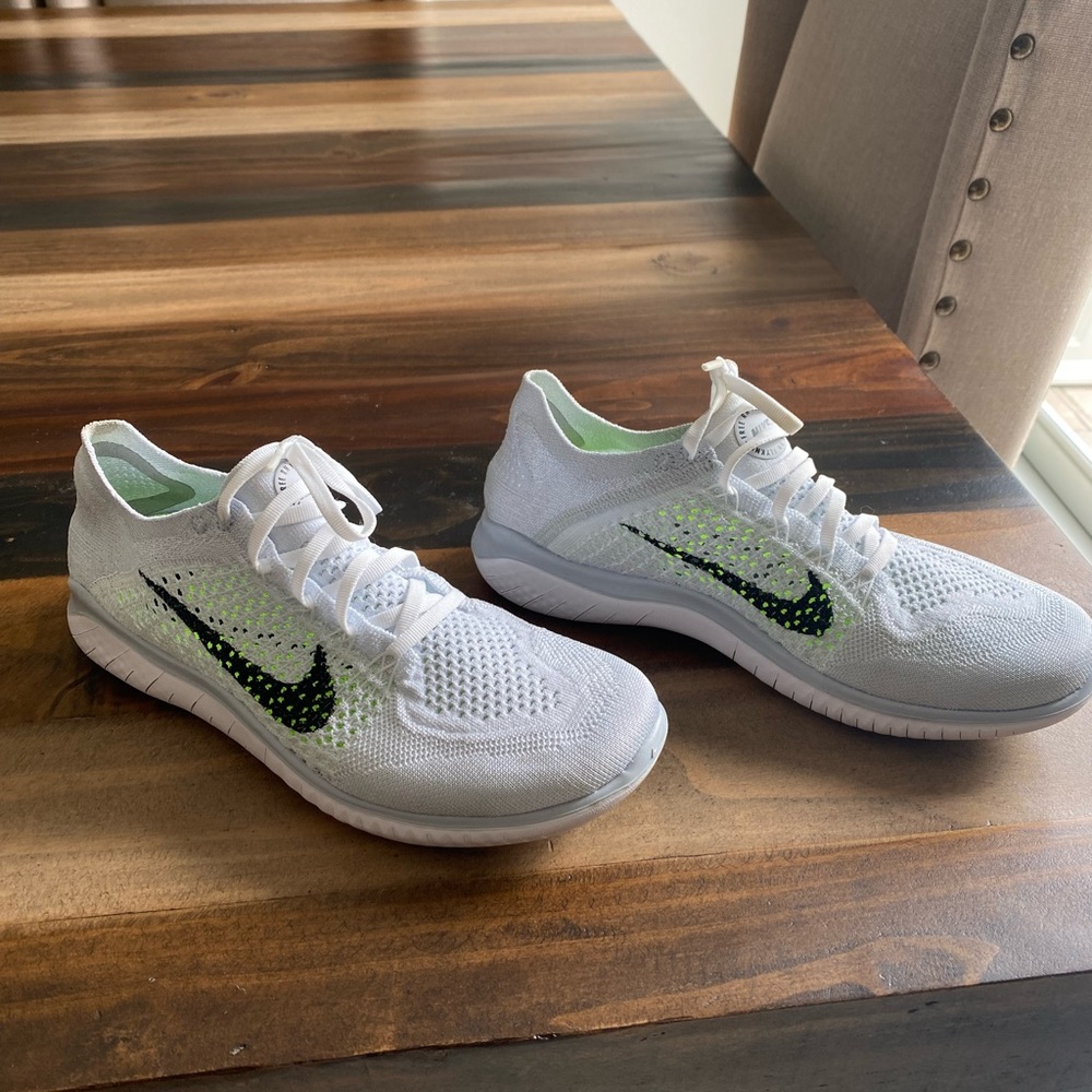 Nike sneakers! Size 9 1/2 and lightly worn. Color is white and baby blue.